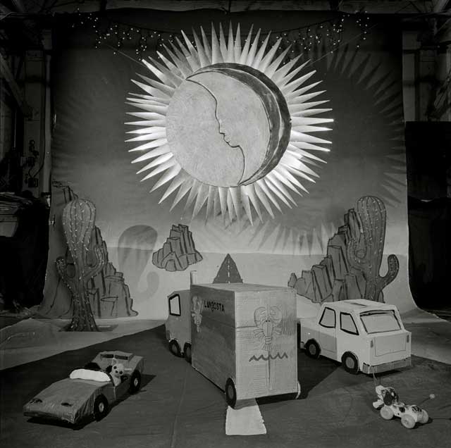 Moonrise over a cardboard desert